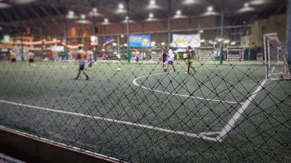 Blurred,And,Selective,Focus,Of,Indoor,Soccer,Field,On,Holiday